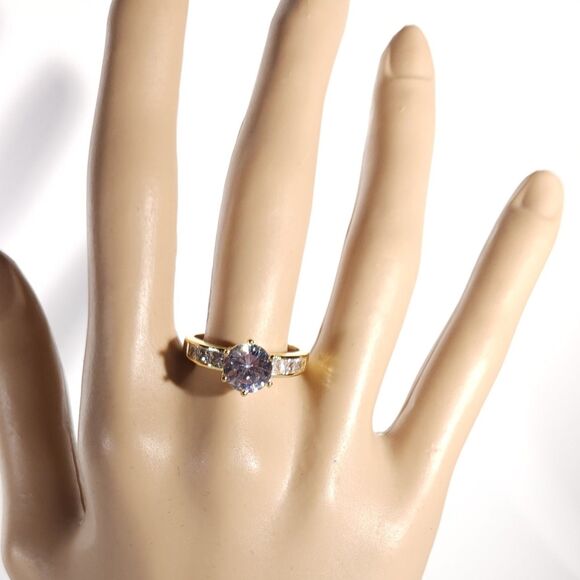 Simulated White Diamond Ring in a Goldtone Ring Size 8 - Picture 8 of 9